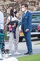 harry styles looks dapper in two suits on dont worry darling set in palm springs 06