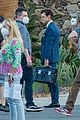 harry styles looks dapper in two suits on dont worry darling set in palm springs 21