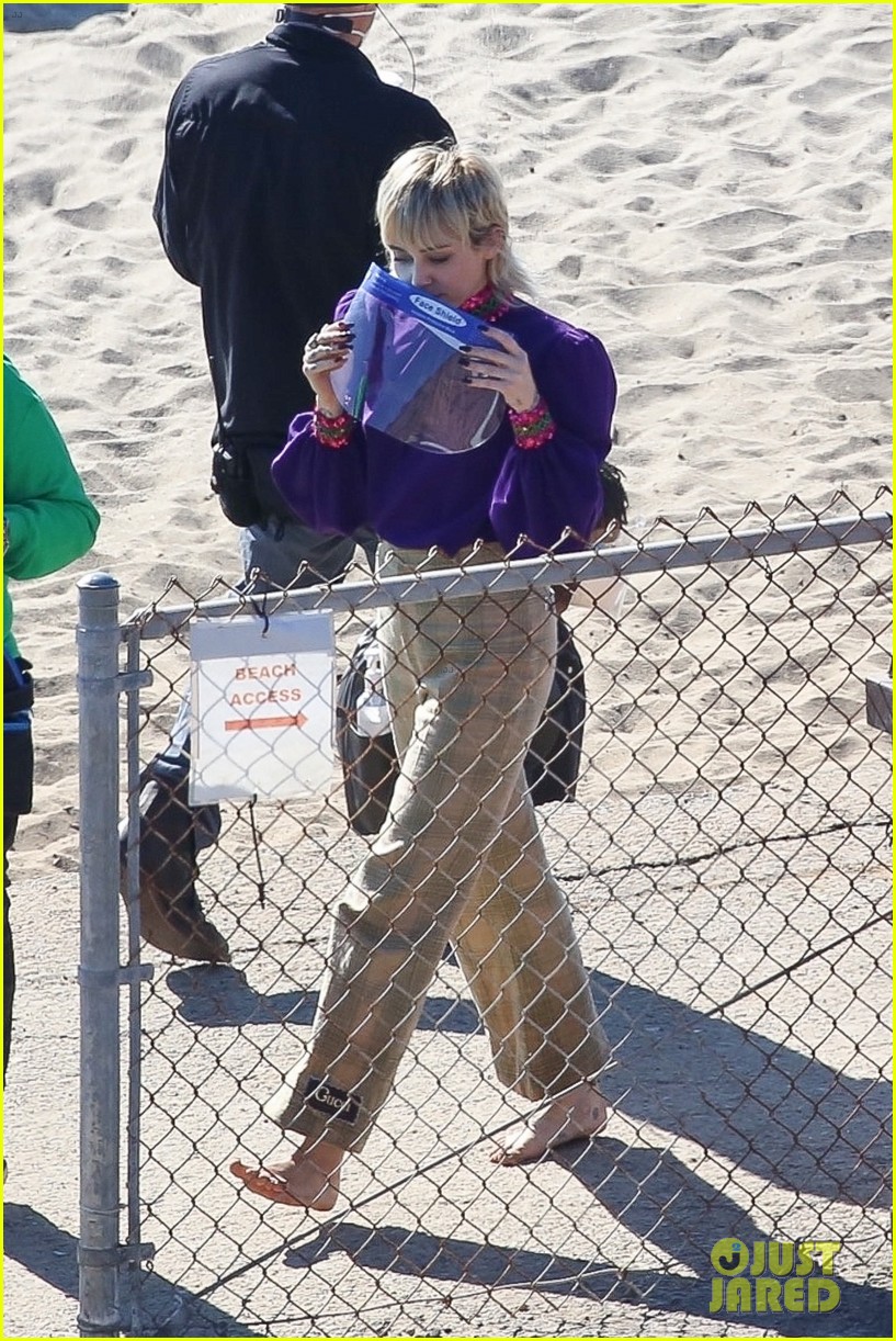 Full Sized Photo of miley cyrus filming new music video at beach 99 ...