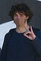 noah centineo turns the camera on paparazzi after a workout 05
