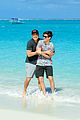 asher angel and his dad have fun in the sun in new turks caicos pics 04