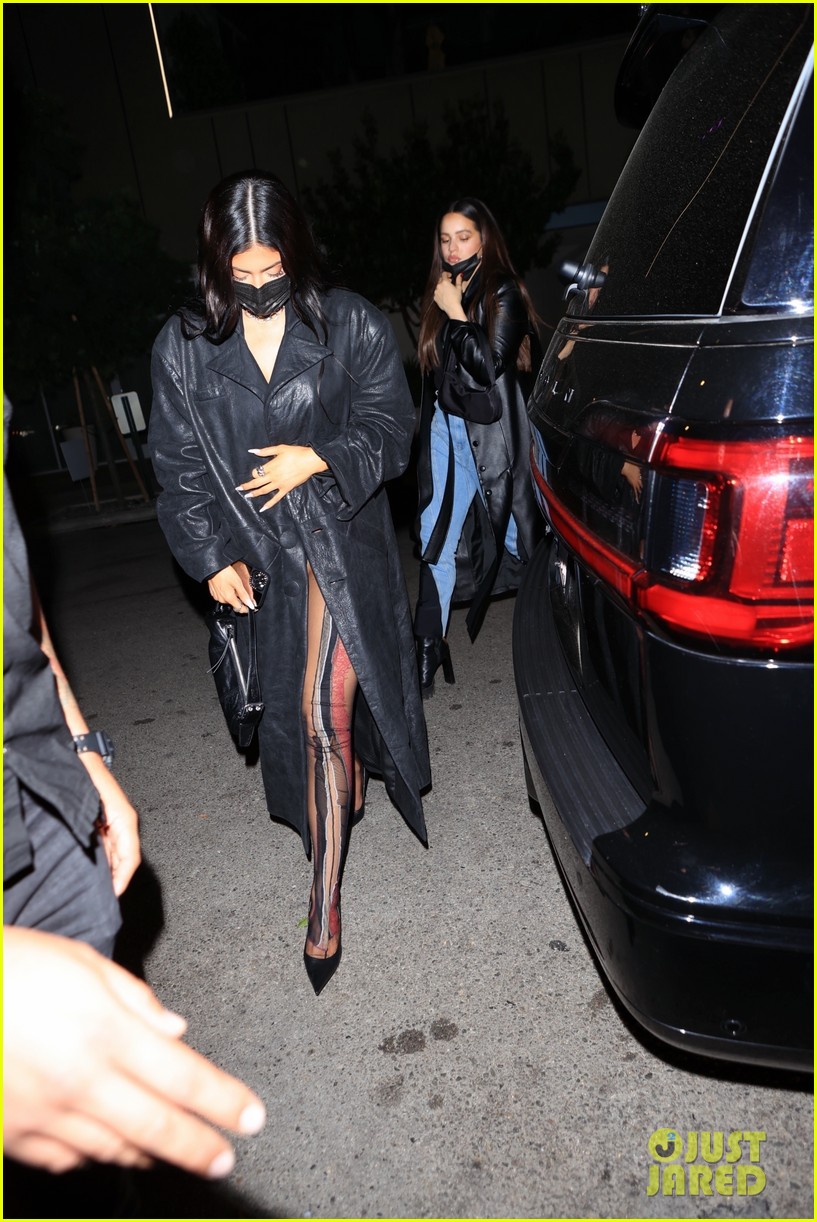 Kylie Jenner & Rosalia Match in Black Trenchcoats at Dinner! Photo