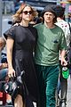 tommy dorfman lucas hedges wrap their arms around each other in nyc 01