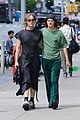 tommy dorfman lucas hedges wrap their arms around each other in nyc 14
