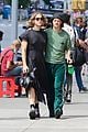 tommy dorfman lucas hedges wrap their arms around each other in nyc 15