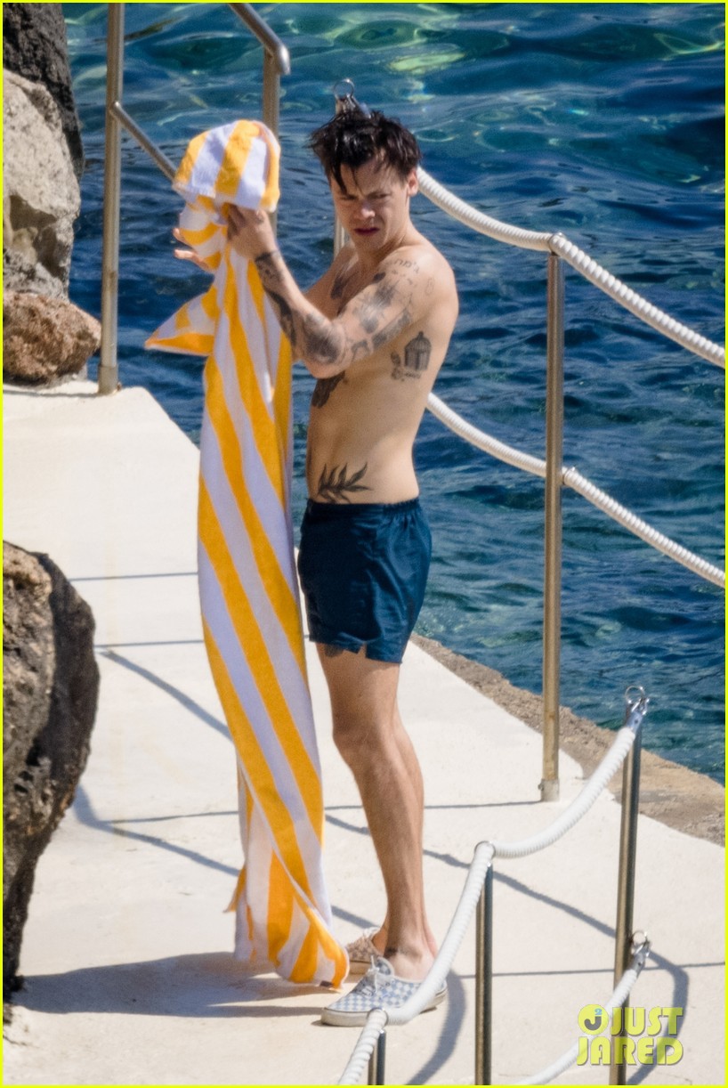 Full Sized Photo of harry styles showers shirtless in italy 28