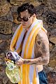 harry styles showers shirtless in italy 02