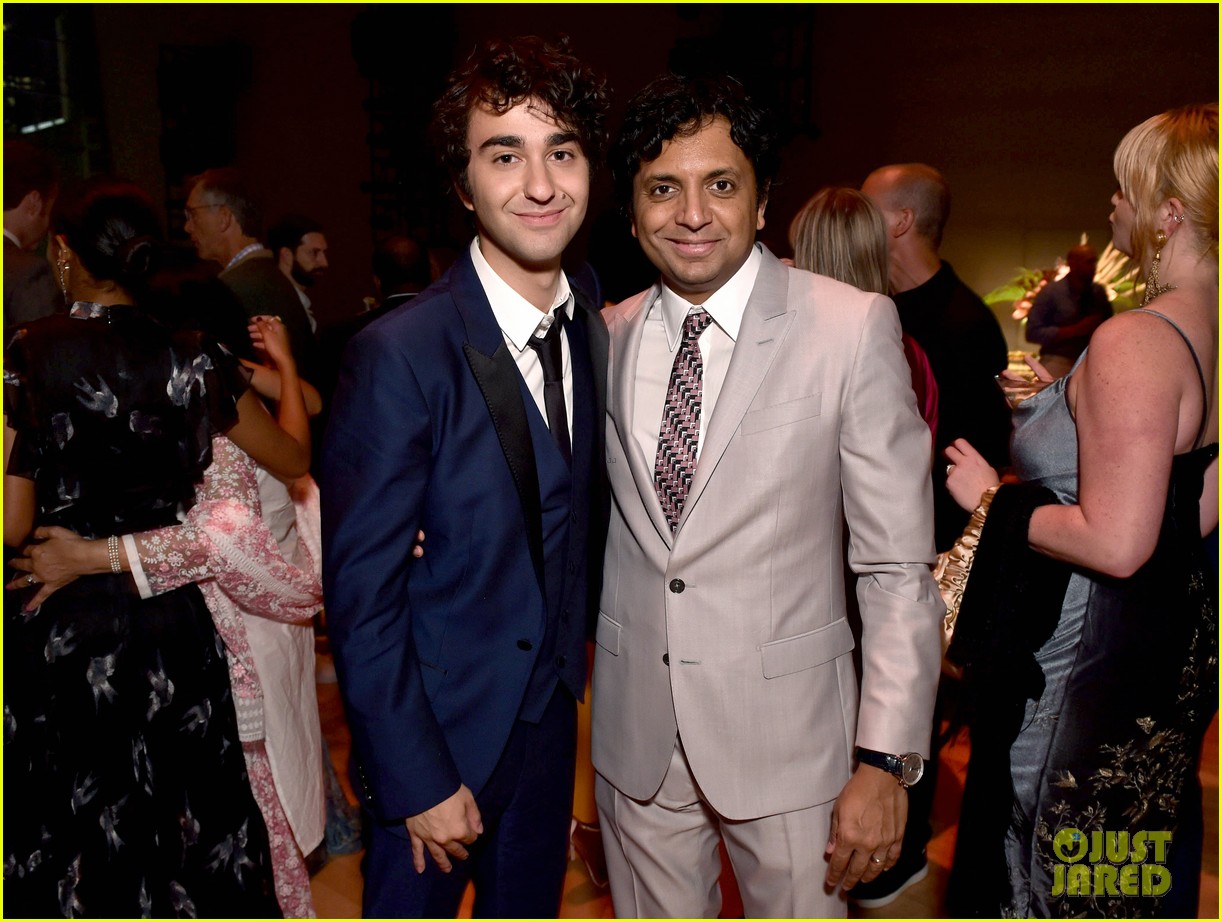 alex wolff poses with younger self nolan river at old premiere 05