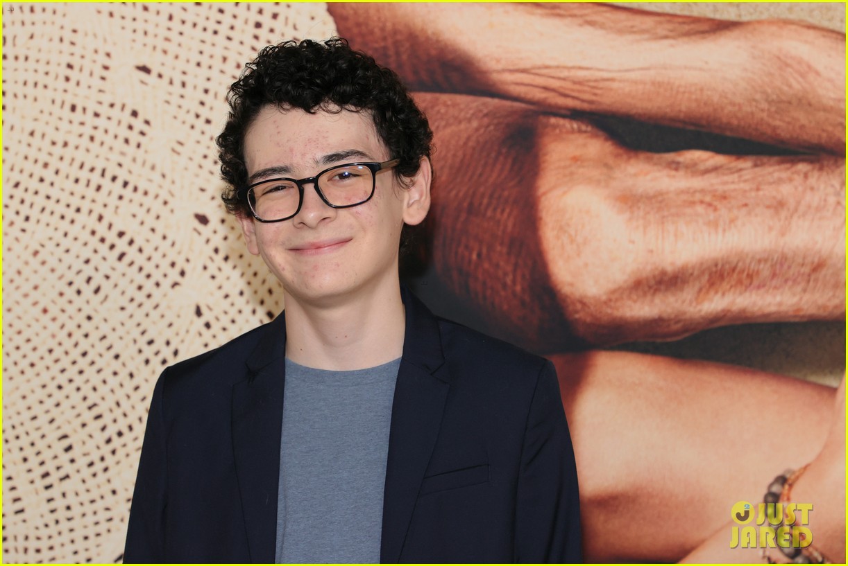 alex wolff poses with younger self nolan river at old premiere 21