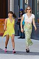 tommy dorfman carries bright blue bag out with rowan blanchard 01