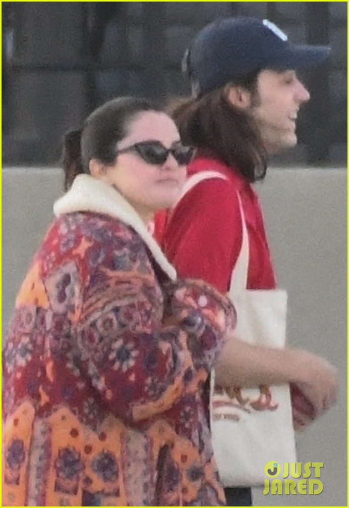 selena gomez boards a yacht for quick trip with friends 04