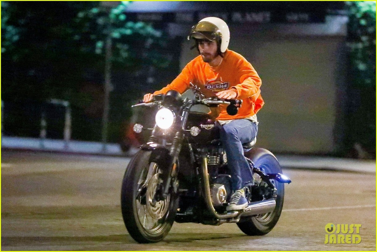 kj apa rides his motorcycle to dinner with friends 01