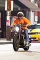 kj apa rides his motorcycle to dinner with friends 05