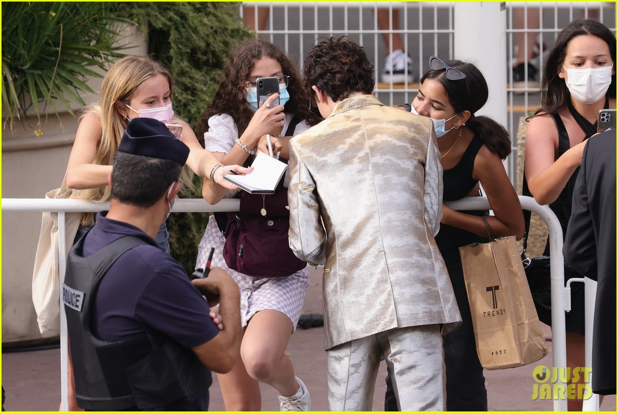 timothee chalamet cozies up to costar tilda swinton at the french dispatch cannes premiere 07