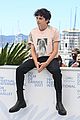 timothee chalamet continues with cute poses at the french dispatch photo call 23