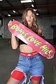 ava michelle tries skateboarding at bones love milk event 01