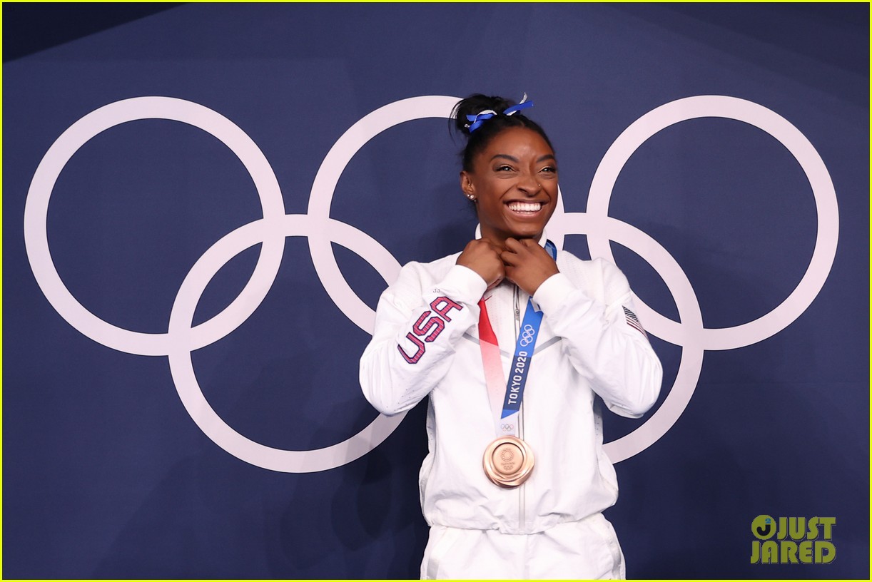 Full Sized Photo of simone biles is beaming after winning bronze at