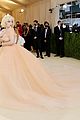 billie eilish needed a lot of help with her giant met gala dress 05