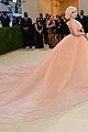 billie eilish needed a lot of help with her giant met gala dress 24