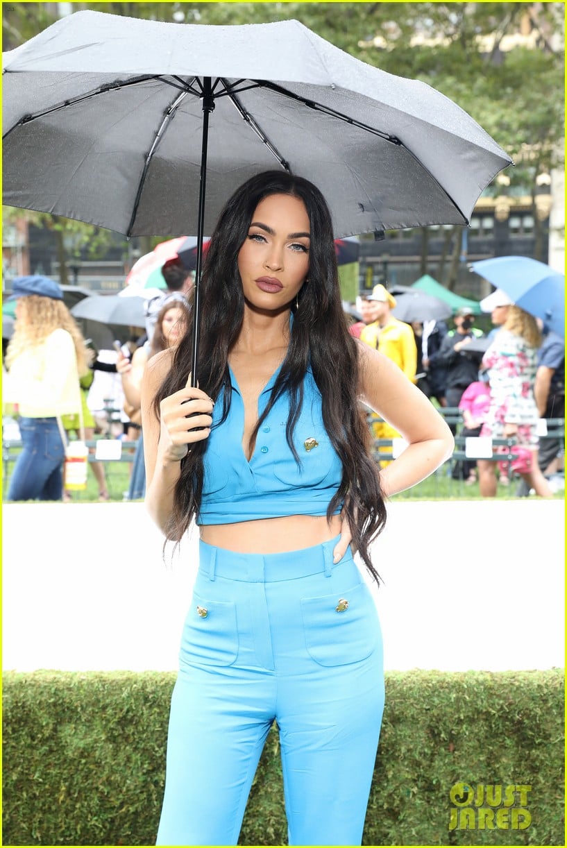 Madelaine Petsch & Tommy Dorfman Sit Front Row at Rainy Moschino