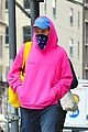 harry styles sports bright pink hooding while hanging out with friends 02