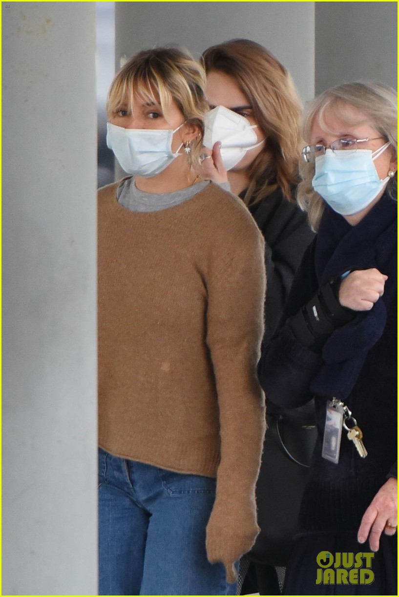 Cara Delevingne Spotted Landing in NYC with Another Famous Star
