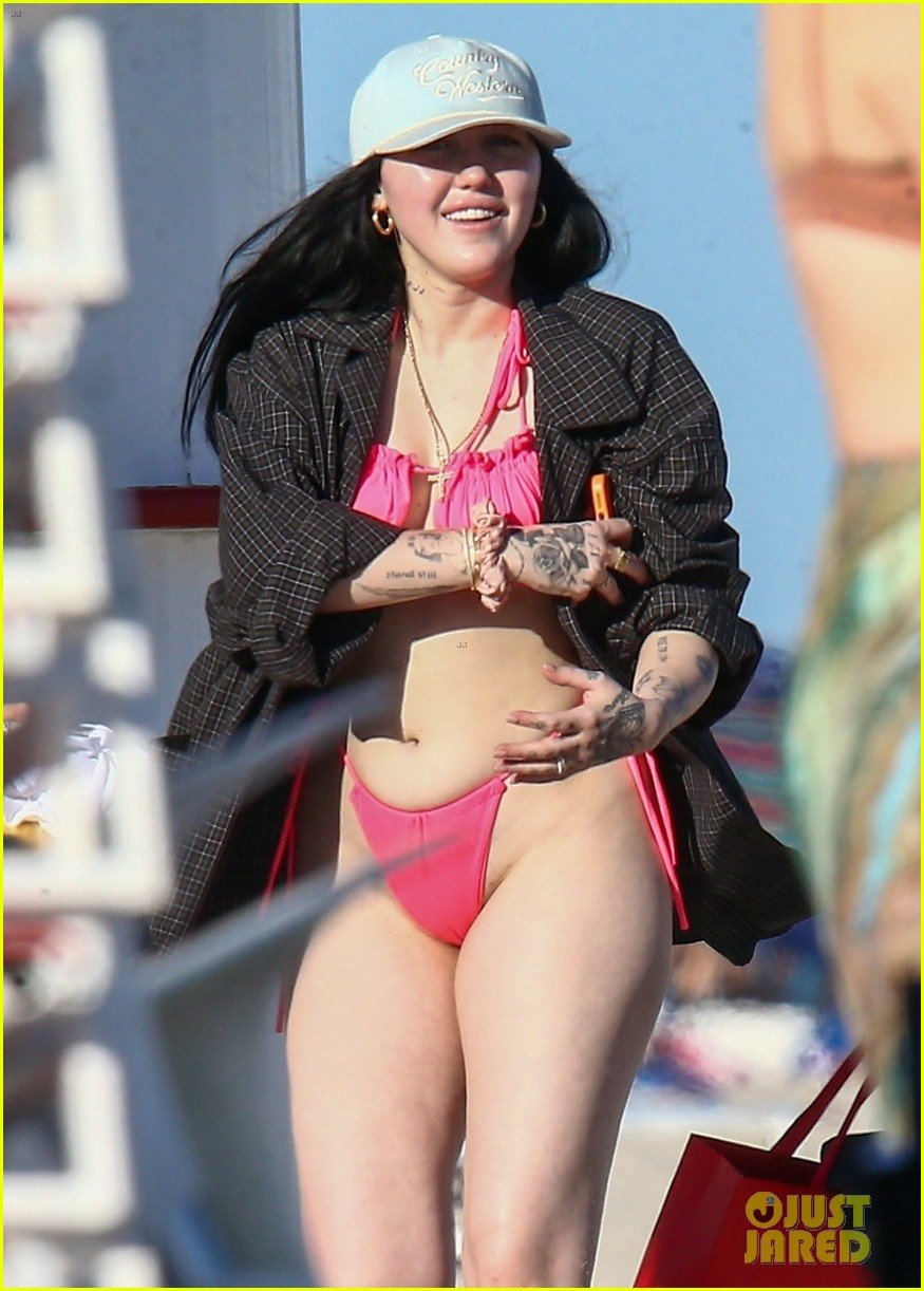 noah cyrus rocks pink bikini for day at the beach 06