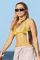 noah cyrus rocks pink bikini for day at the beach 03