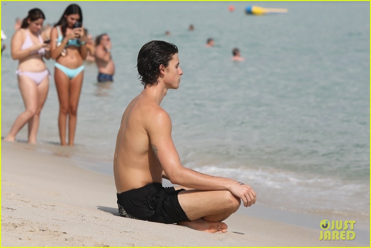 shawn mendes meditates at the beach 03