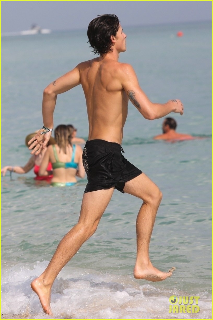 shawn mendes meditates at the beach 04