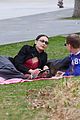 bella hadid kisses marc kalman kiss picnic nyc 18