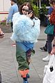 dove cameron wears fluffy blue jacket while out in london 01