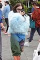 dove cameron wears fluffy blue jacket while out in london 10