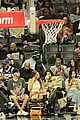 kendall jenner kylie jenner sit courtside at game 10