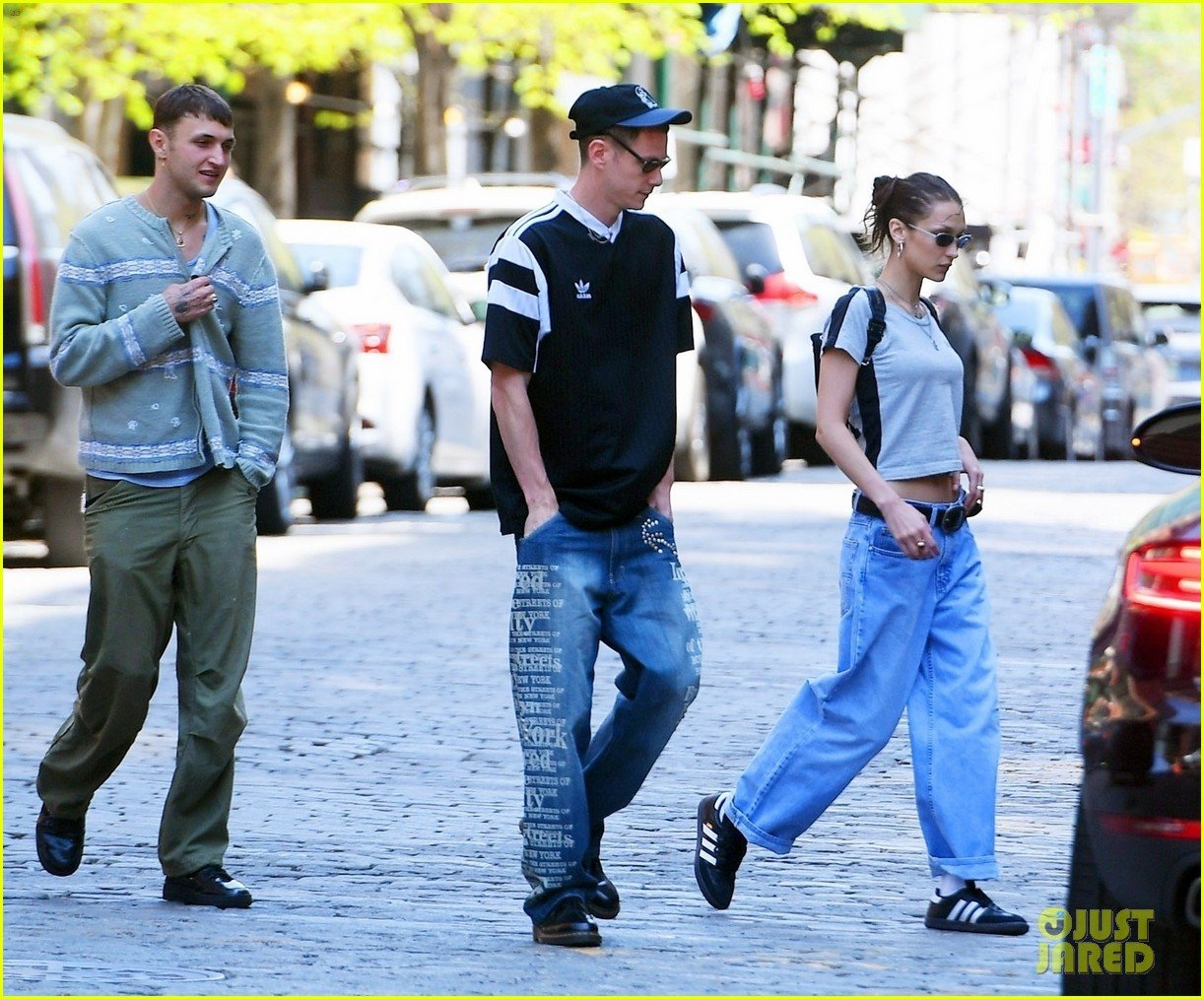 Full Sized Photo of bella hadid marc kalman hold hands leaving gigi