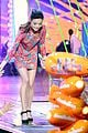 look back at miranda cosgroves kids choice awards orange carpet looks over the years 06