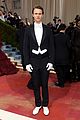 ansel elgort shares a moment with adrien brody on the met gala steps 03