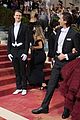 ansel elgort shares a moment with adrien brody on the met gala steps 04