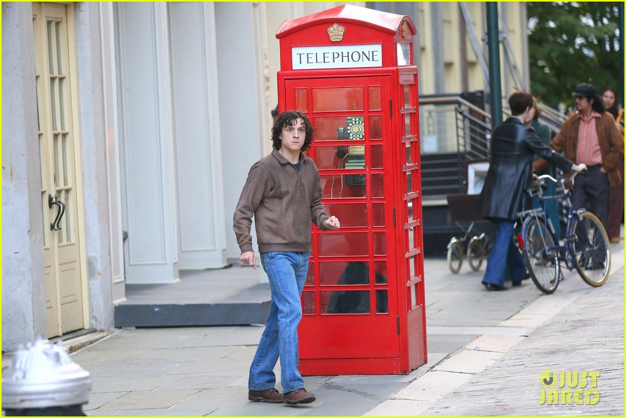 Full Sized Photo of tom holland looks distressed filming the crowded