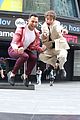corbin bleu joshua bassett jump for joy in front of hsmtmts times square billboard 03