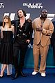 joey king gets squished between brad pitt aaron taylor johnson at premiere 09