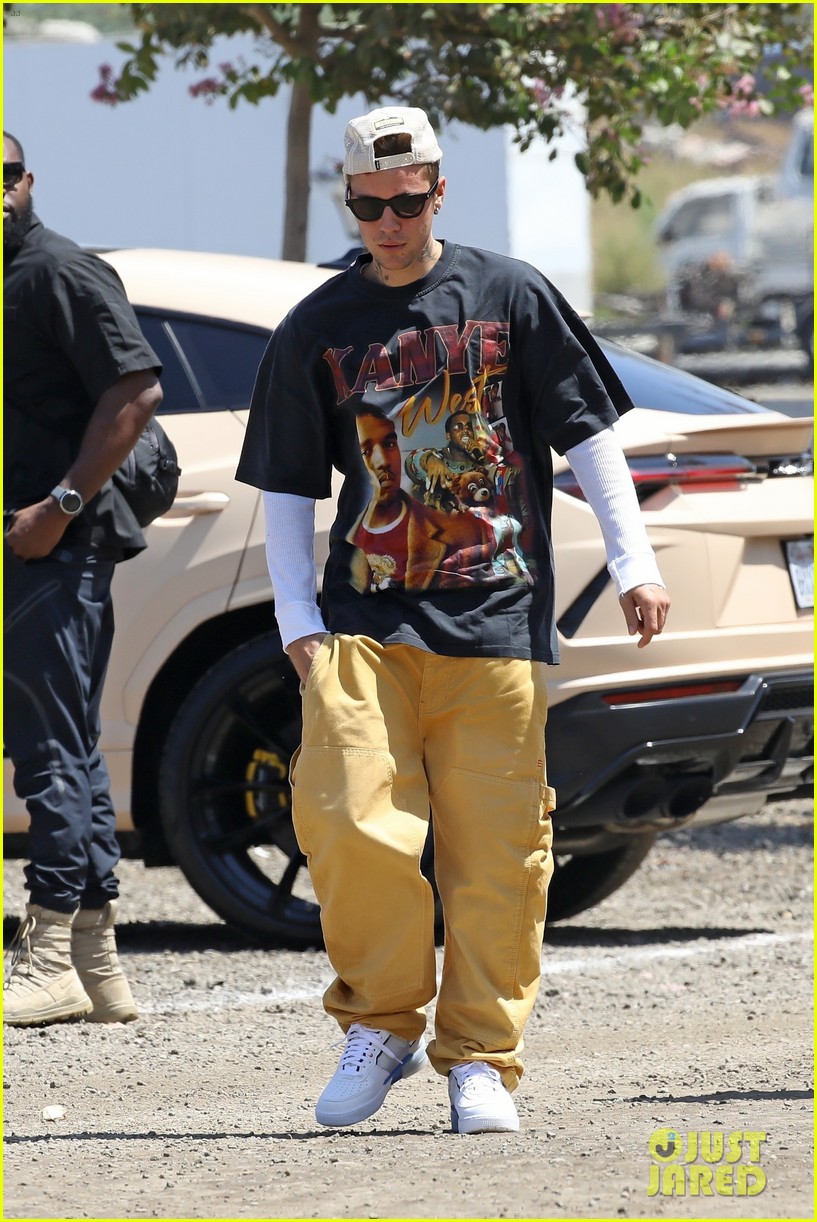 Justin Bieber Wears Kanye West Shirt While Attending A Party With Wife