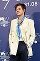 harry styles joins dont worry darling costars at venice film festival photo call 08