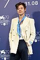 harry styles joins dont worry darling costars at venice film festival photo call 09