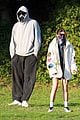 jacob elordi olivia jade cover their faces for outings 02