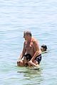 charlie gillespie owen patrick joyner get in shirtless workout at the beach 04