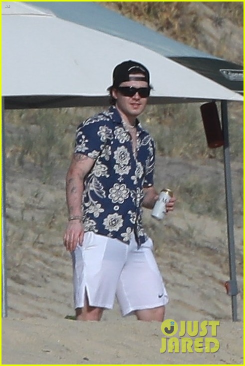 Selena Gomez & BFF Nicola Peltz Share Big Hug During Beach Day in Cabo