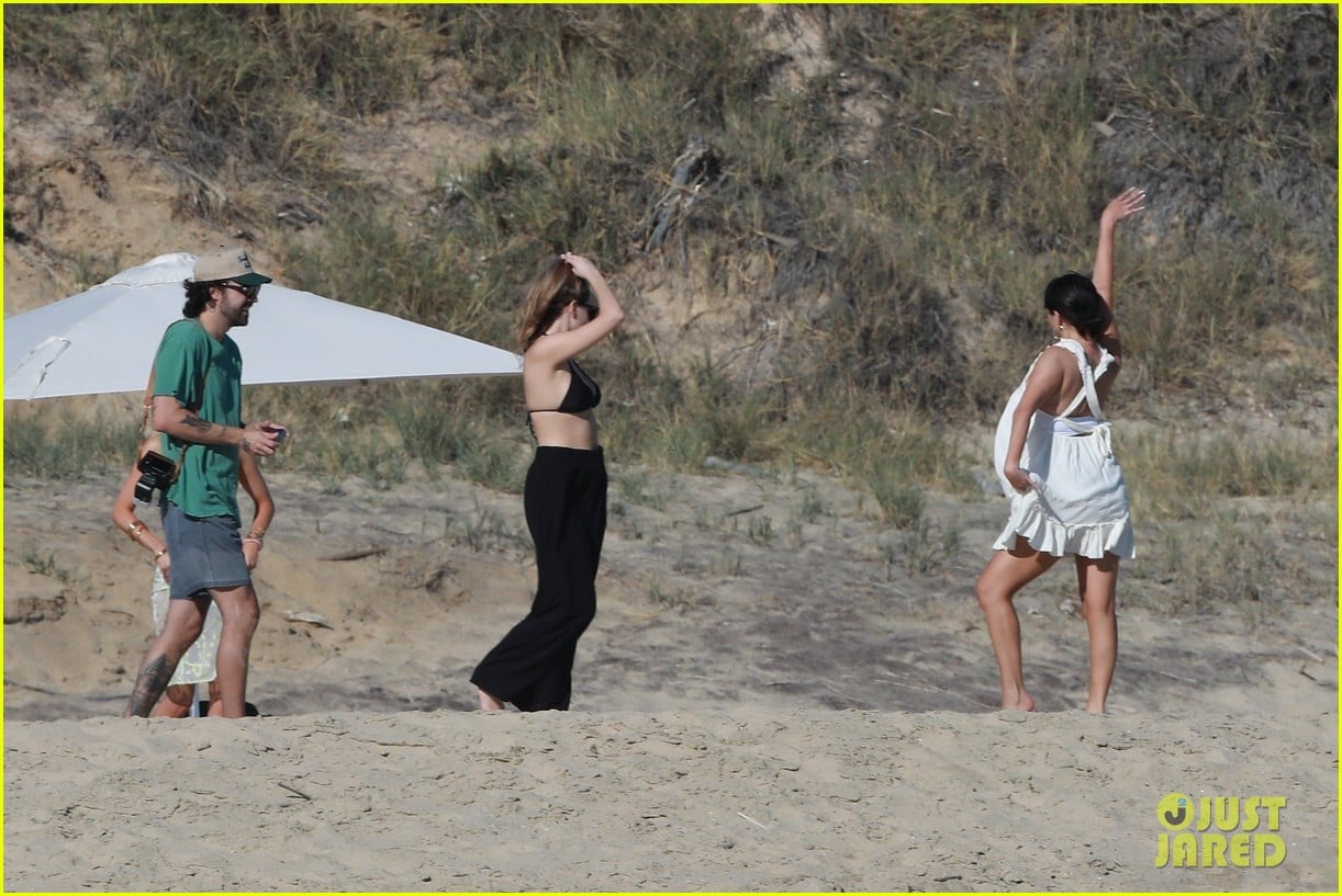 Selena Gomez & BFF Nicola Peltz Share Big Hug During Beach Day in Cabo