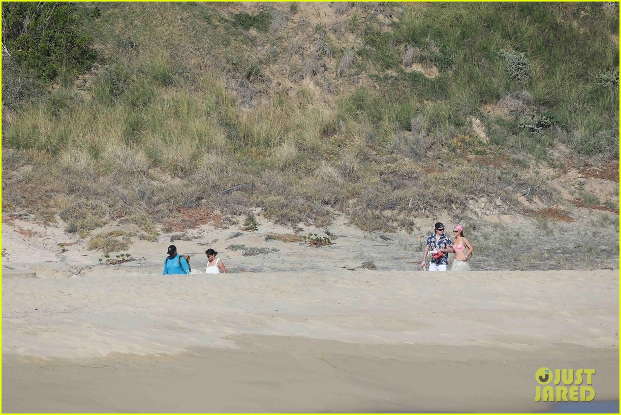 Selena Gomez & BFF Nicola Peltz Share Big Hug During Beach Day in Cabo