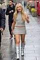 sabrina carpenter wears silver boots on rainy london day 01